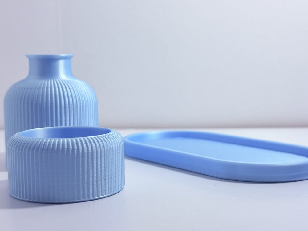 Ribbed vase and matching tealight holder shown empty, undecorated
